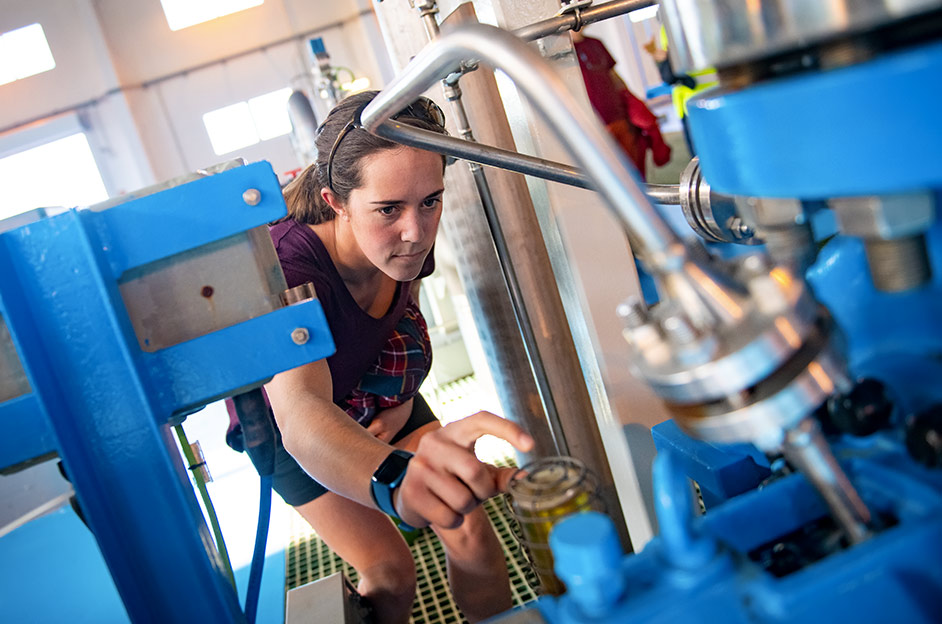 Student working with water system