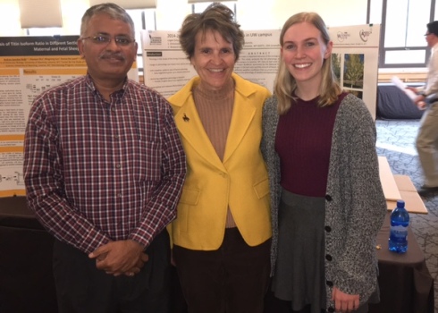 Ramesh Sivanpillai, Laurie Nichols, and Logan Eicholzer with poster