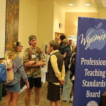 Photo of Elizabeth McMahan connecting with College of Educaiton students.