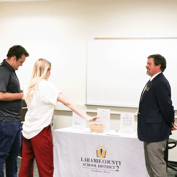 Photo of College of Education students connecting with district leadership.