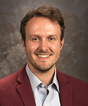 Photo of Nicholas Jesse, Senior Project Coordinator for WSUP.