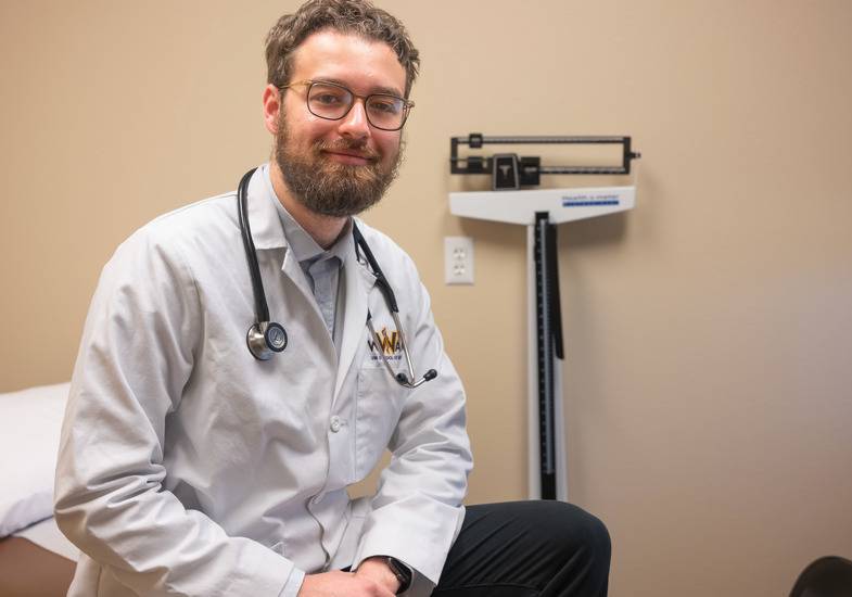 Student in white coat