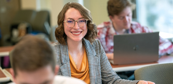 med student smiles in class