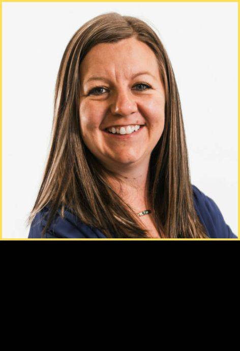 Dr. Casey Starks, wearing a dark blue blouse.