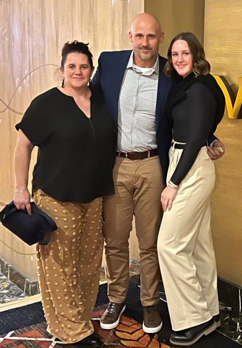 Annika with her parents.