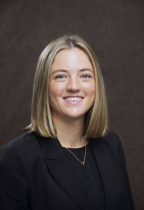 Annabel Hagen wearing a black jacket and black blouse.
