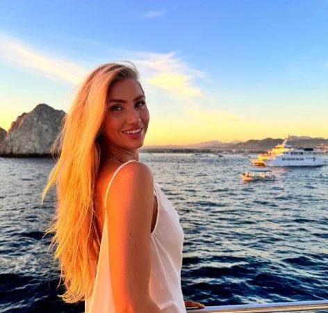 Alexis with the ocean in the background.