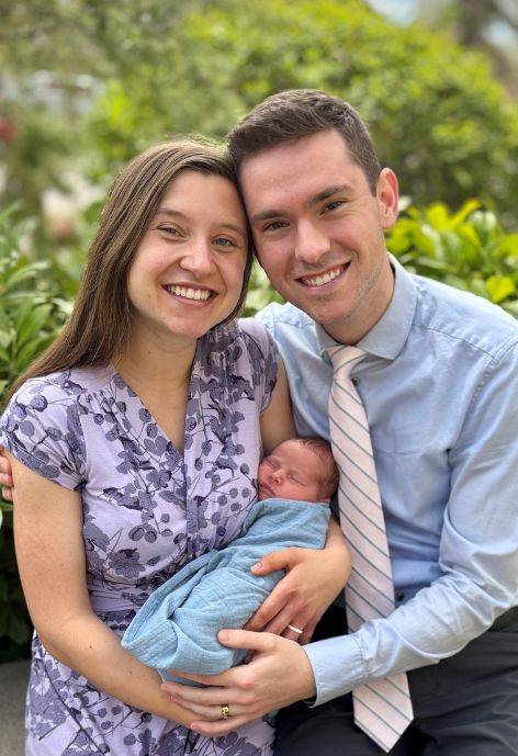 Jordan with his wife and newborn baby.