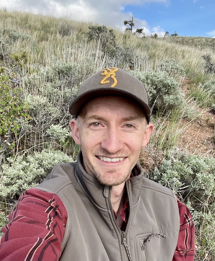 jarom sitting in sagebrush
