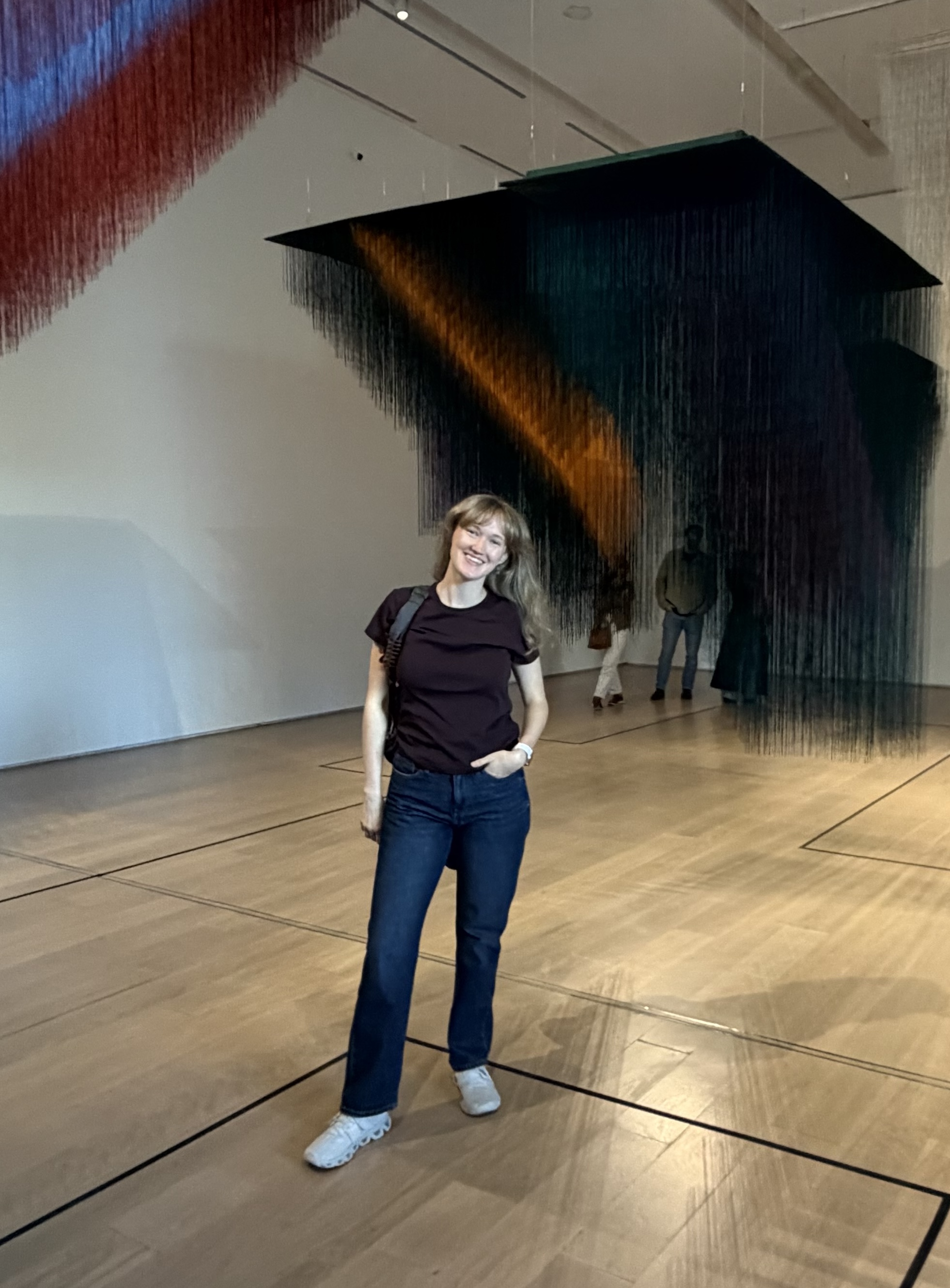 olivia posing in an art museum