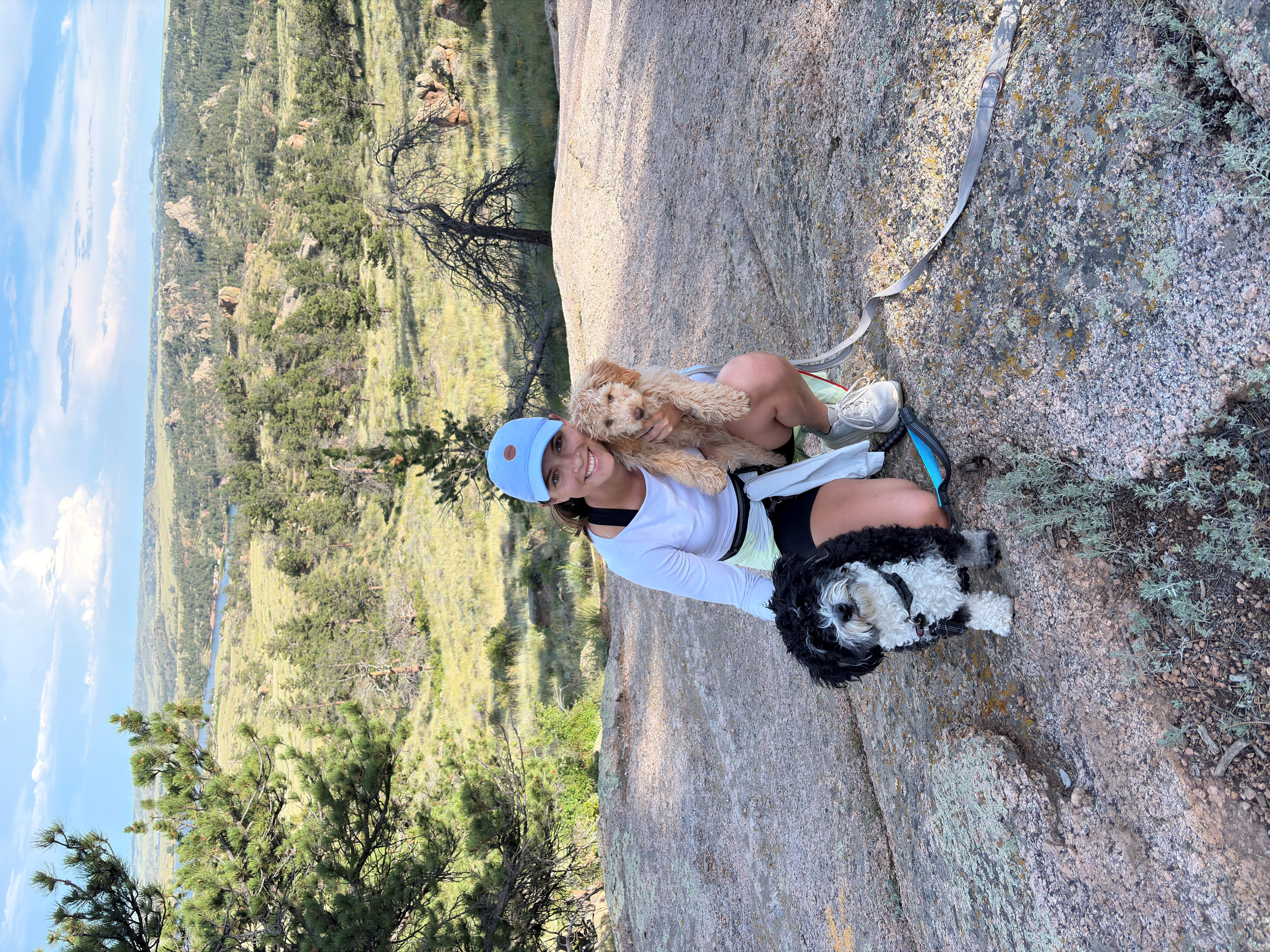 madyson hiking with two small dogs