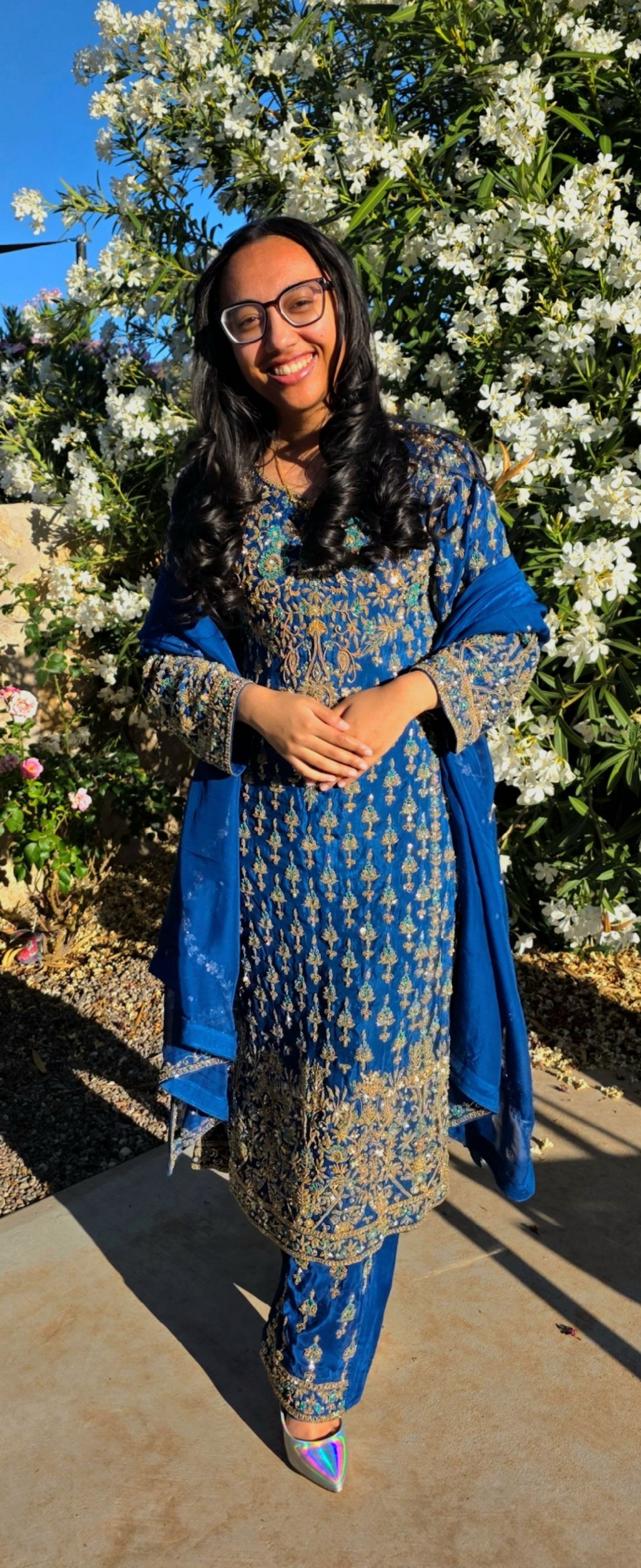 alhena wearing a blue anarkli suit