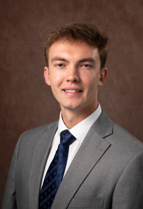 porter wearing a suit and tie