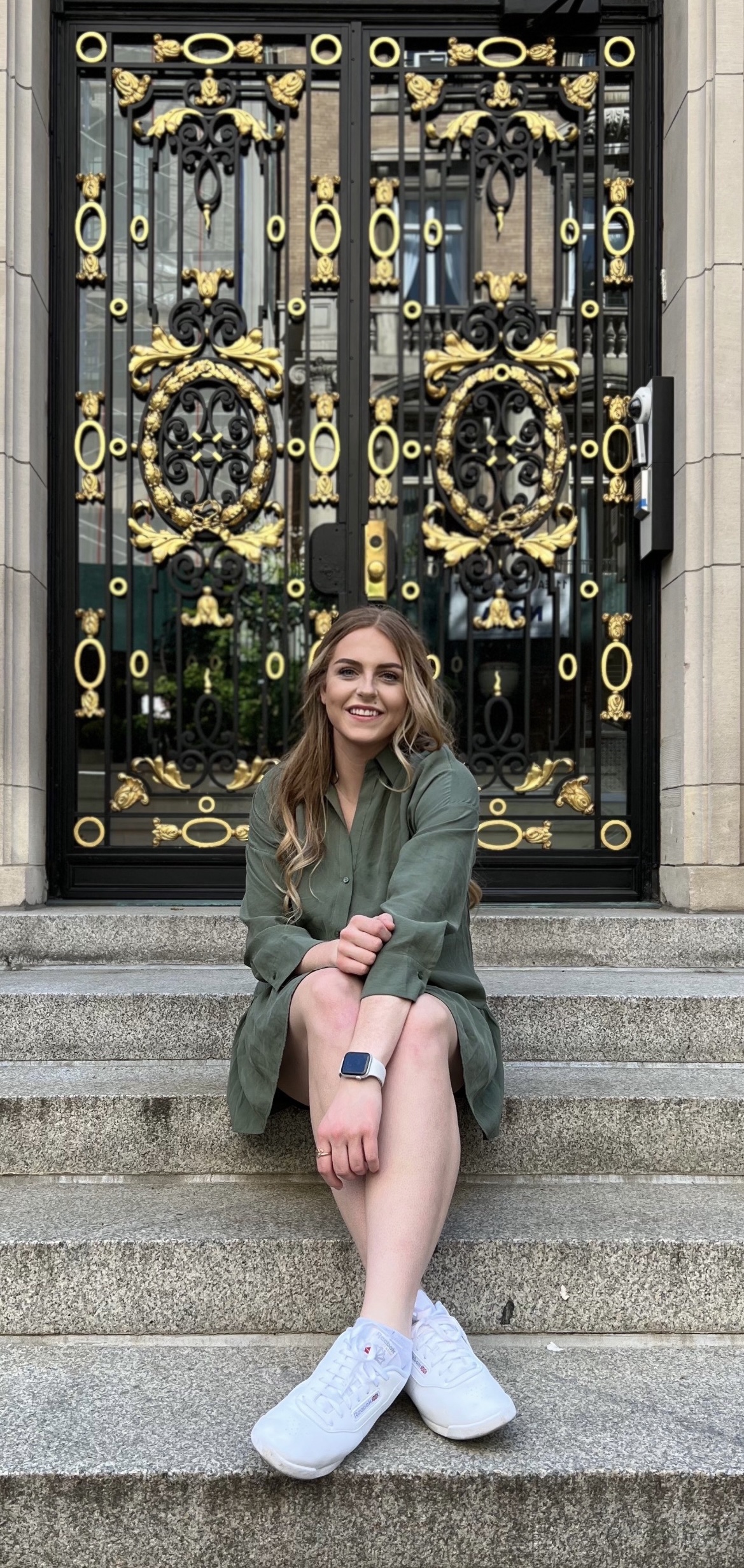sydney sitting on stairs