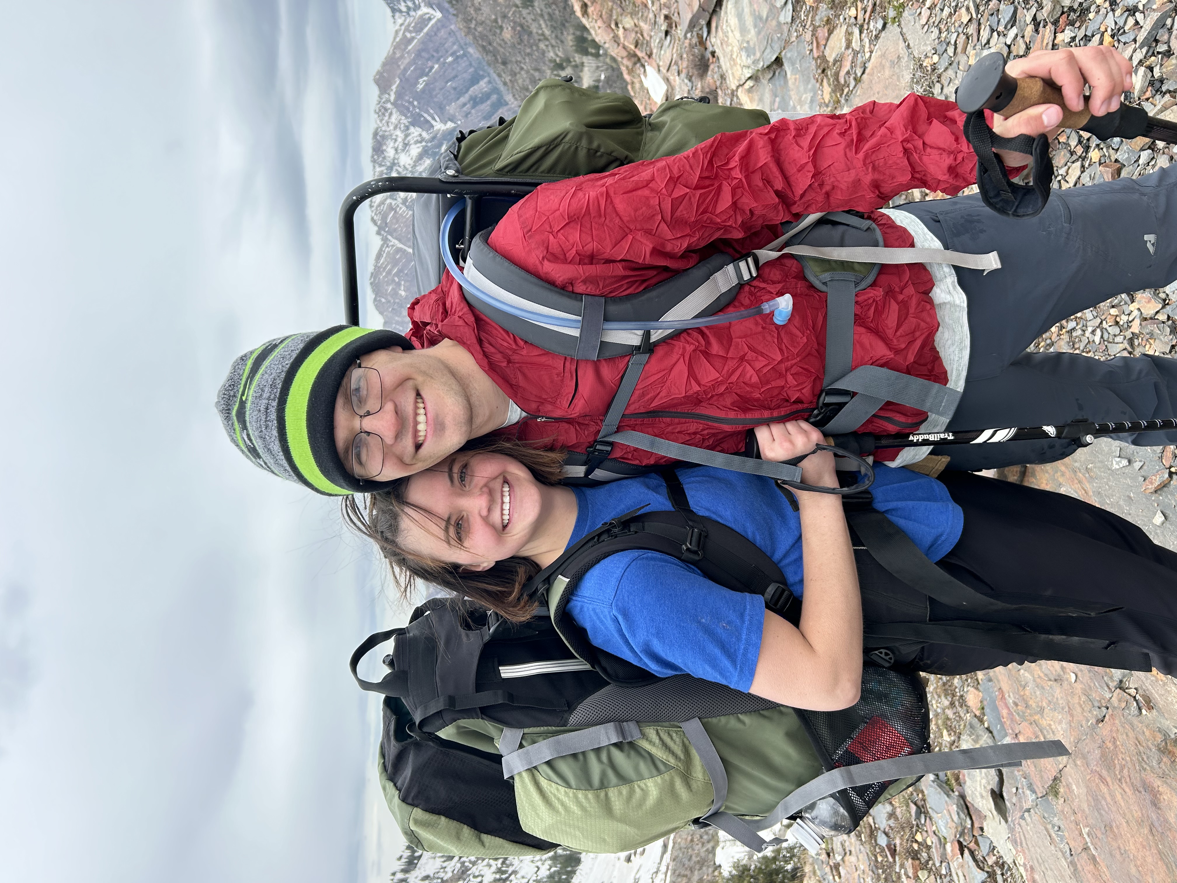 gavin backpacking with his wife in the mountains