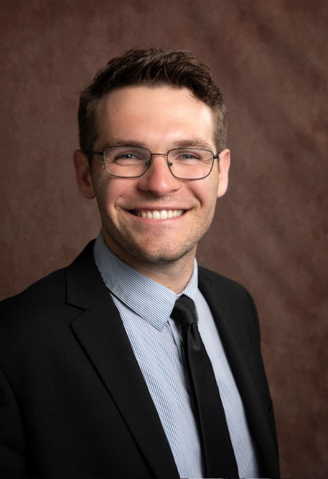 gavin in a suit and tie