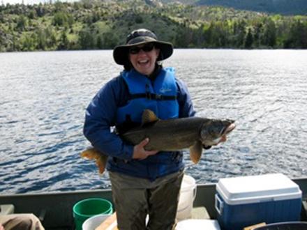woman holding big fish