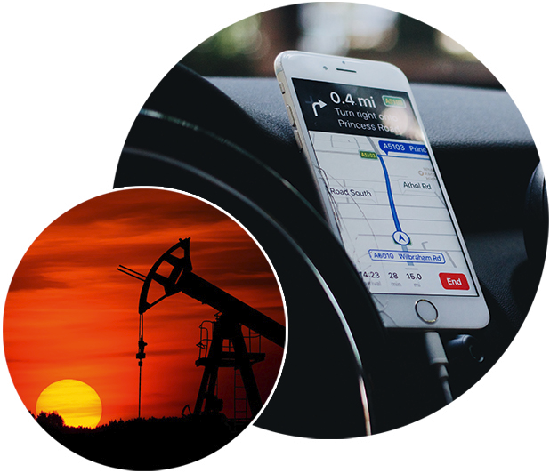 An oil well at sunset, and a phone with a maps app open.