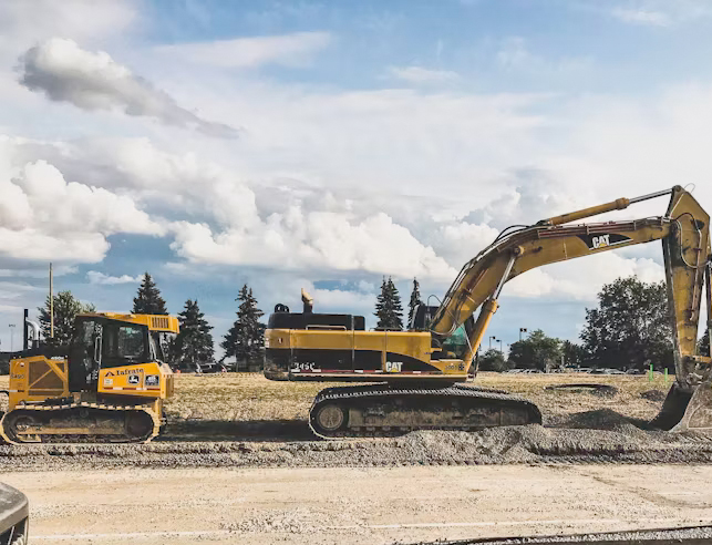 Tractors building a road